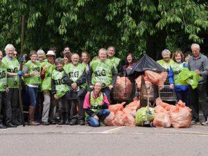 Members of the community with their rubbish sacks