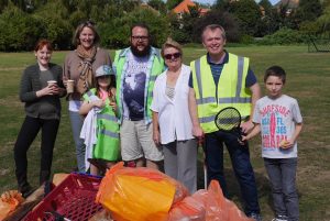 Group of litter pickers with their spoils