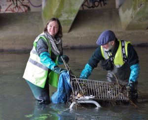 Photo of volunteers in the river