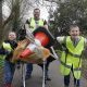 Photo of a family returning with their litter finds